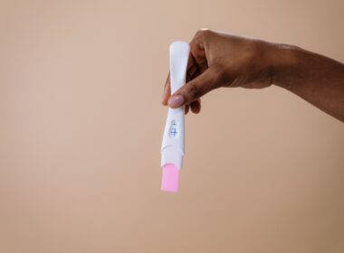 Person Holding a Pregnancy Test